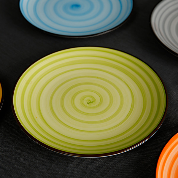 Colorful ceramic disc with black edge